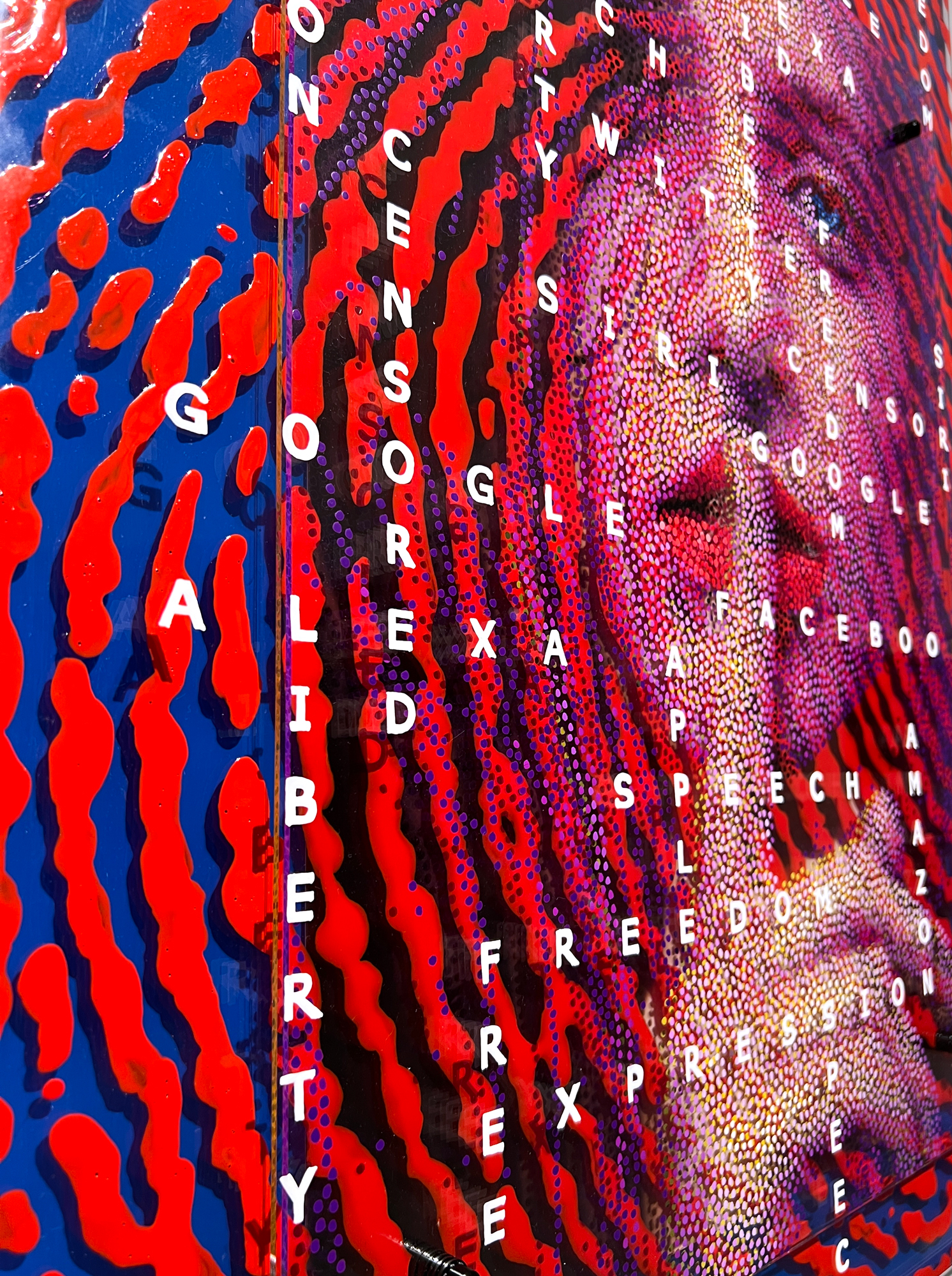 Shhhh! – Side angle of layered plexiglass with words over portrait and red graphic stripes