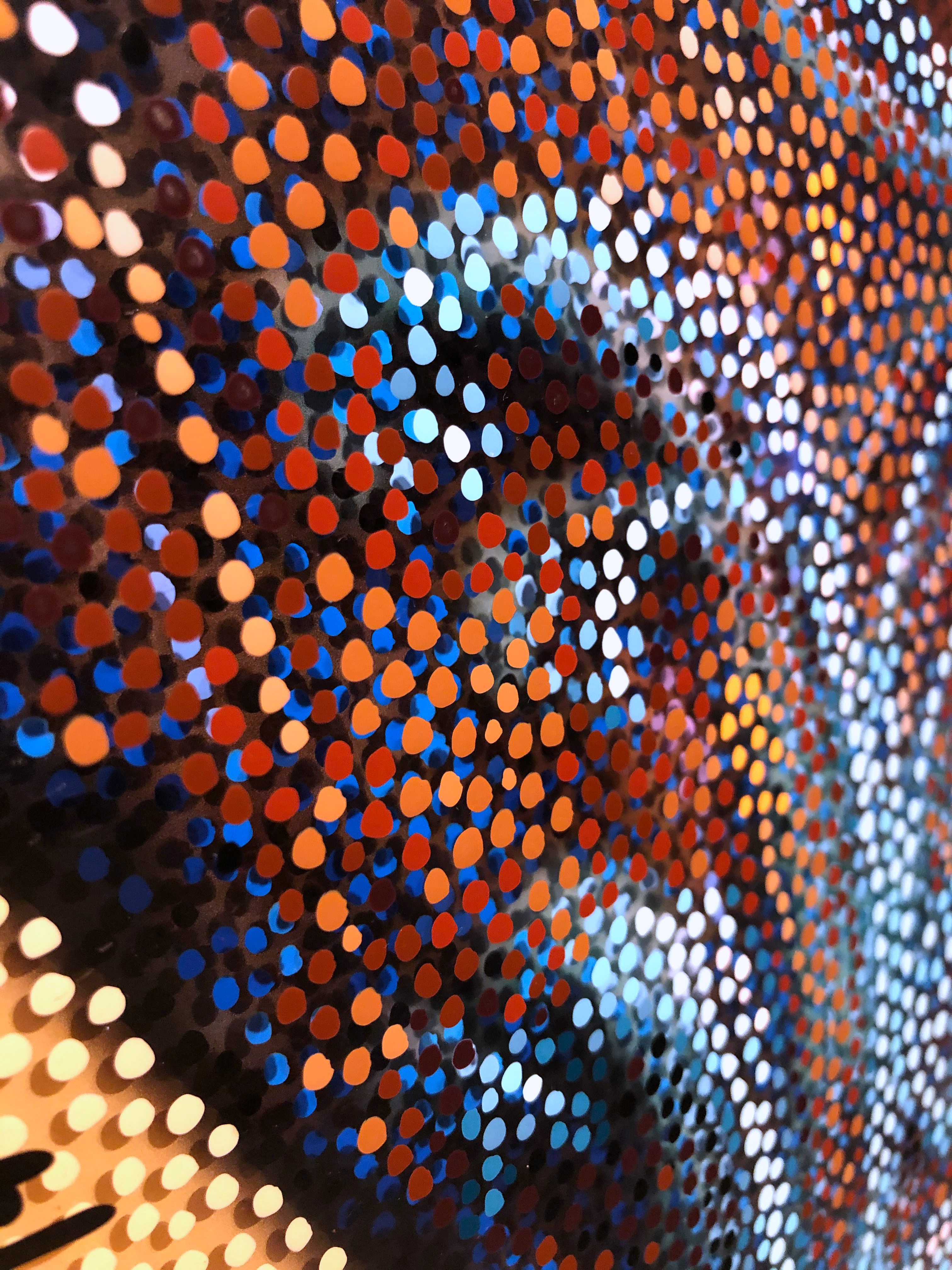 Volto Musica – Close-up of orange, blue, and white Neo-Pointillist dots