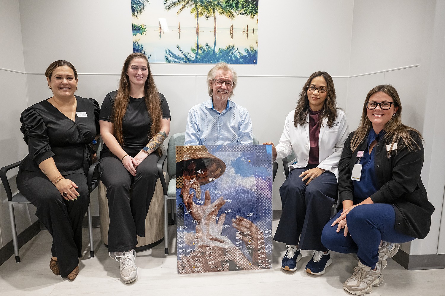Robert Shirk with Dr. Padmaja Sai and Florida Cancer Specialists staff after donating Chemo