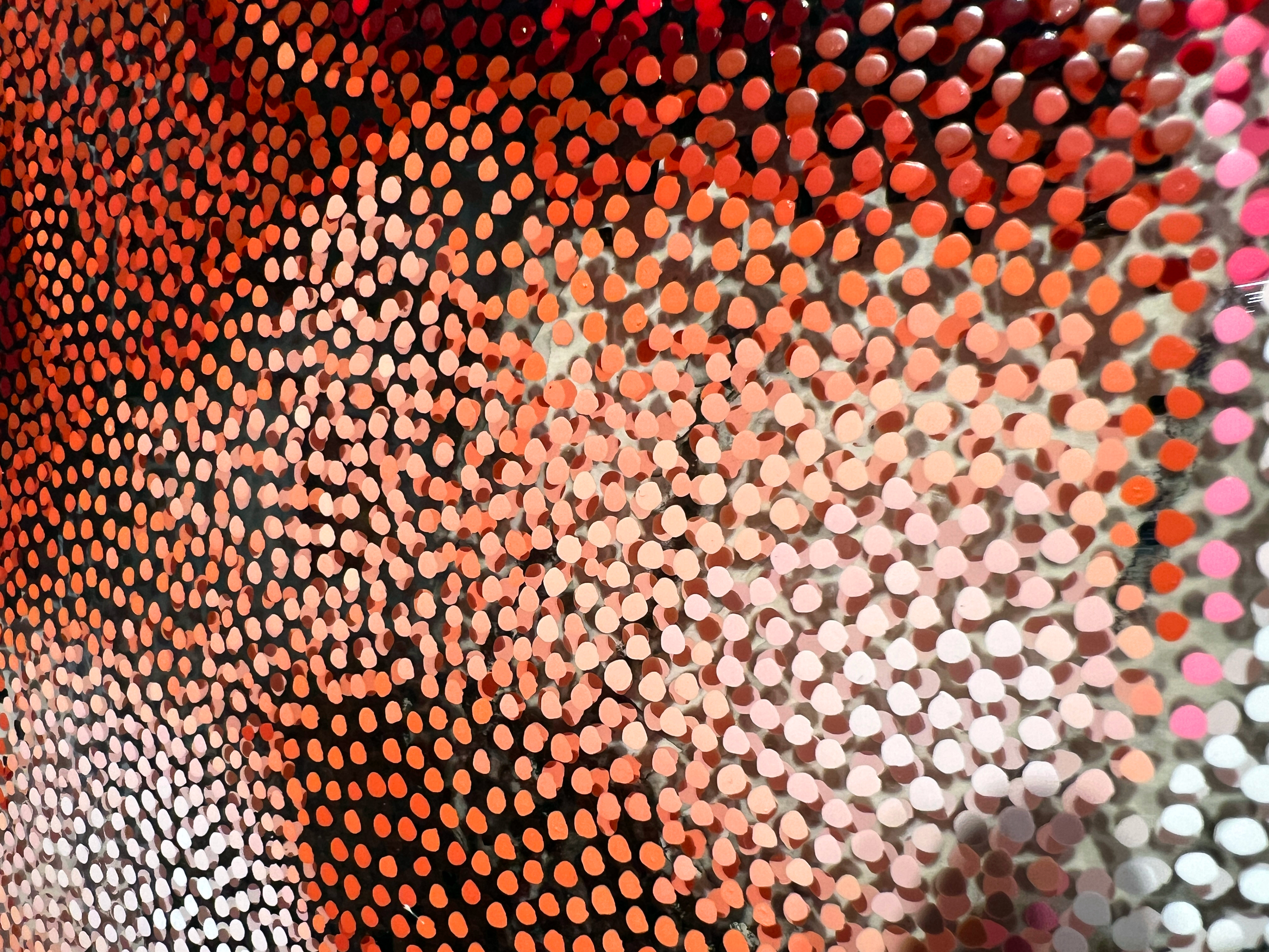 Mother Was Right – Close-up of orange and pink Neo-Pointillist dots on plexiglass