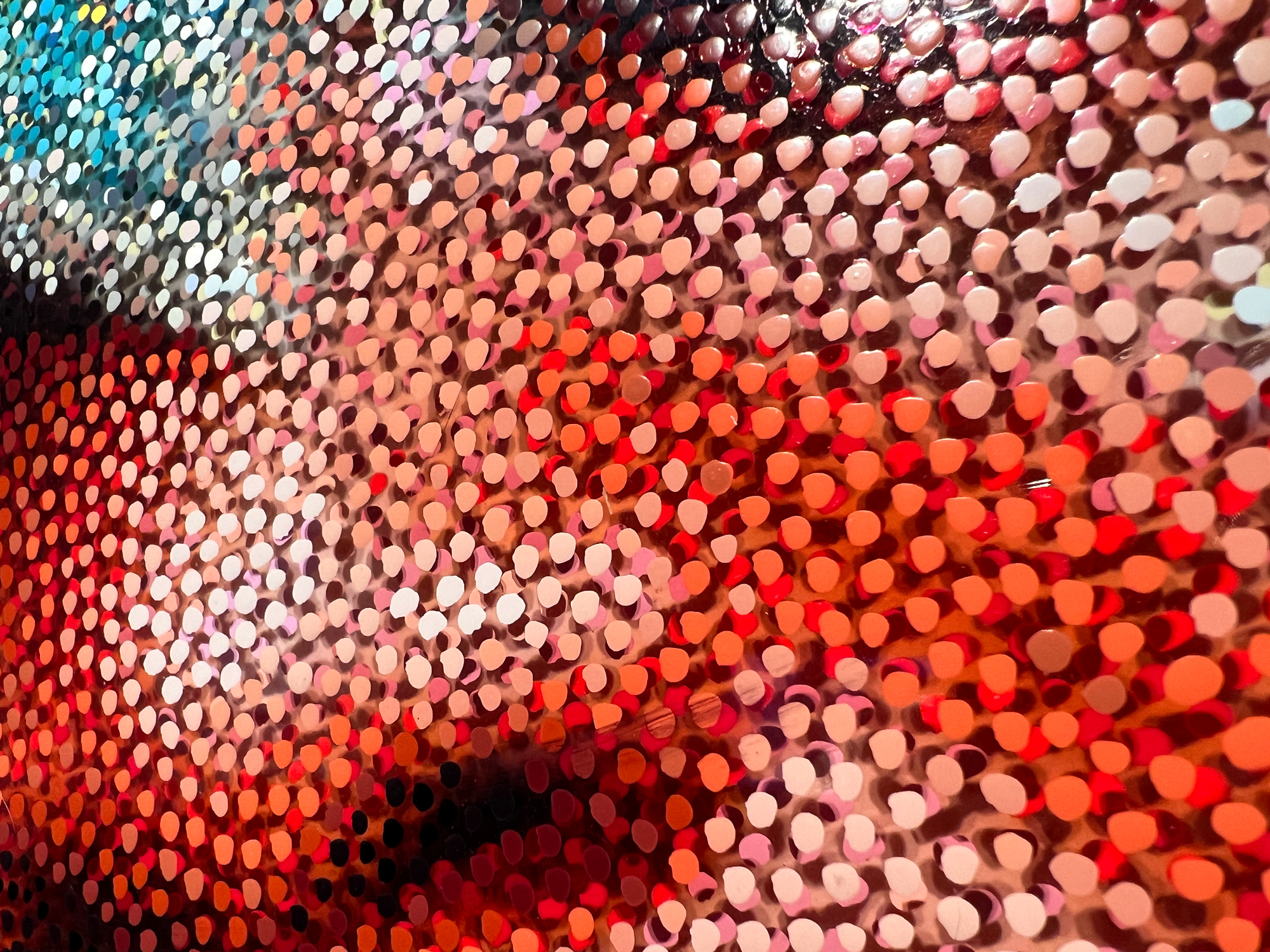 Wholey Mas – Close-up of peach, red, and white Neo-Pointillist dots on plexiglass