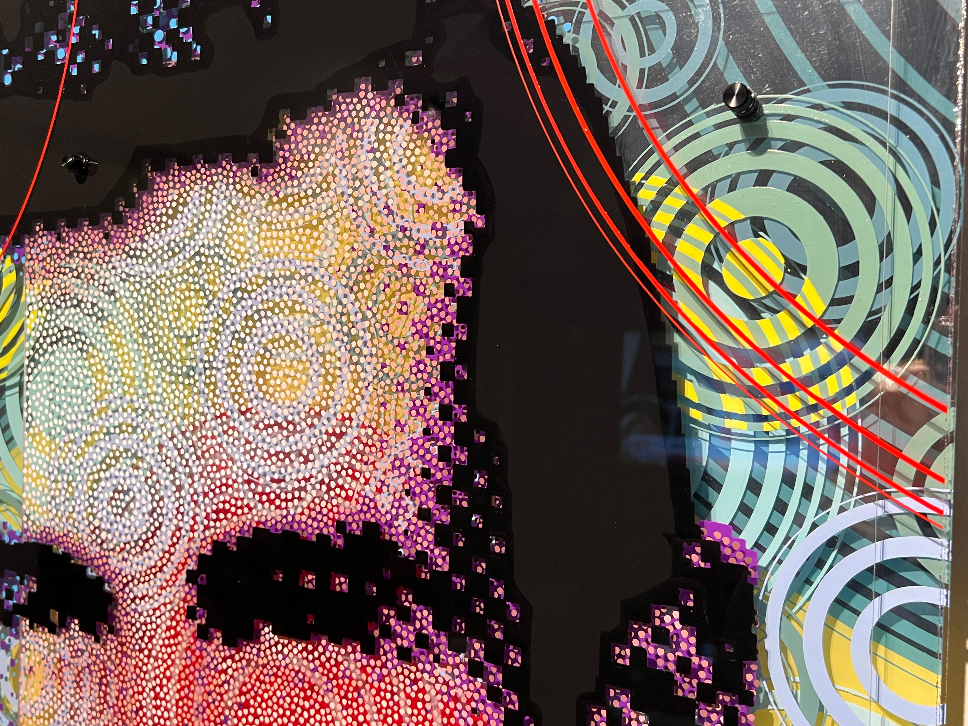 Young Jim Shirk – Detail showing layered portrait, red lines, and concentric background rings